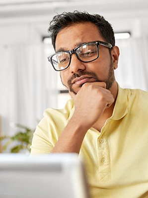 Stressed man with laptop