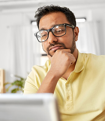 Stressed man with laptop