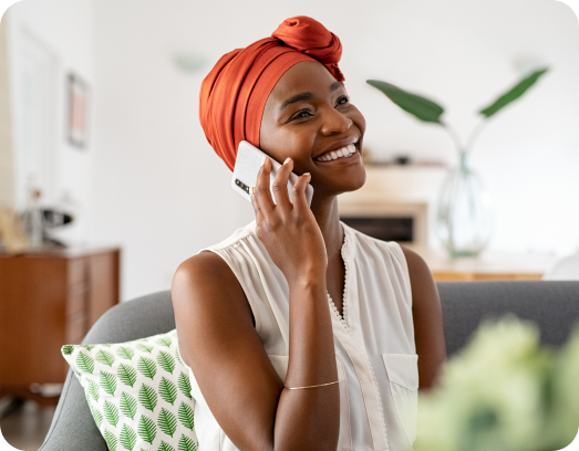 mature african woman talking over phone