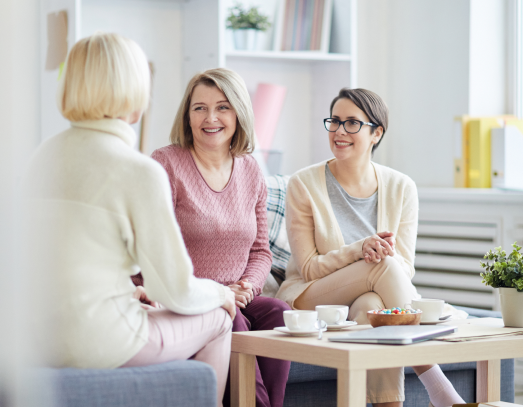 cheerful women chatting